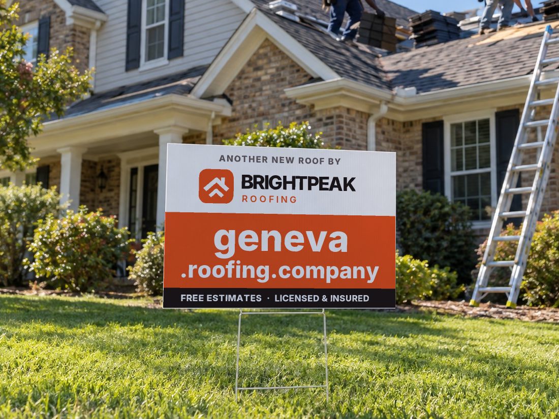 geneva.roofing.company on a yard sign in front of a house getting a new roof